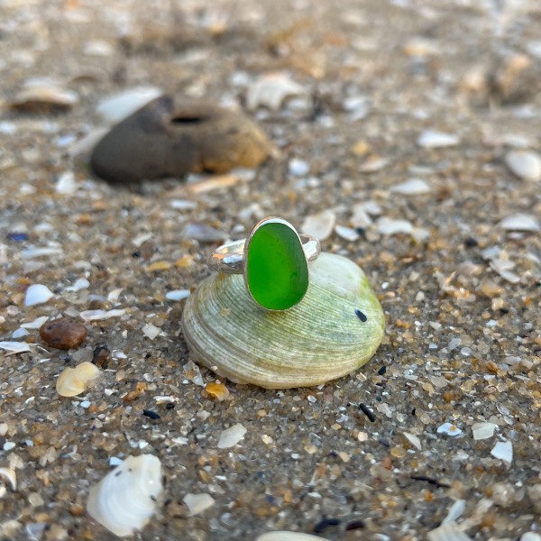 Green sea glass set in silver on organic hammered ring band by Mornington Sea Glass. Size 7.