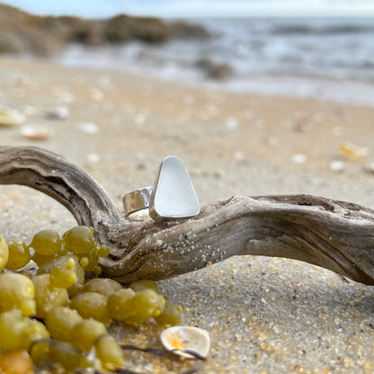 White Sea glass set in Argentium silver with hammered sterling silver textured ring band by Mornington Sea Glass.