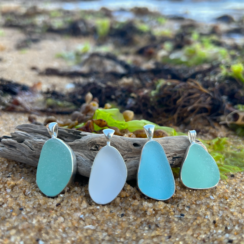 Sea glass set in silver pendants by Mornington Sea Glass. Hangs on a 40 or 45cm sterling silver snake chain.