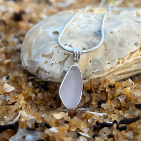 Purple sea glass set in silver pendant by Mornington Sea Glass. Comes with a 40 or 45cm snake chain.