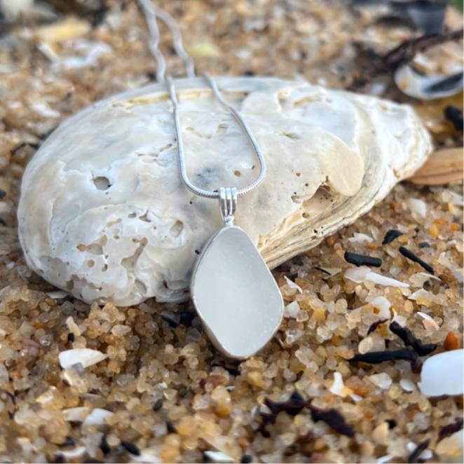 White Sea glass set in silver pendant by Mornington Sea Glass. Hangs on a 40cm or 45cm sterling silver snake chain