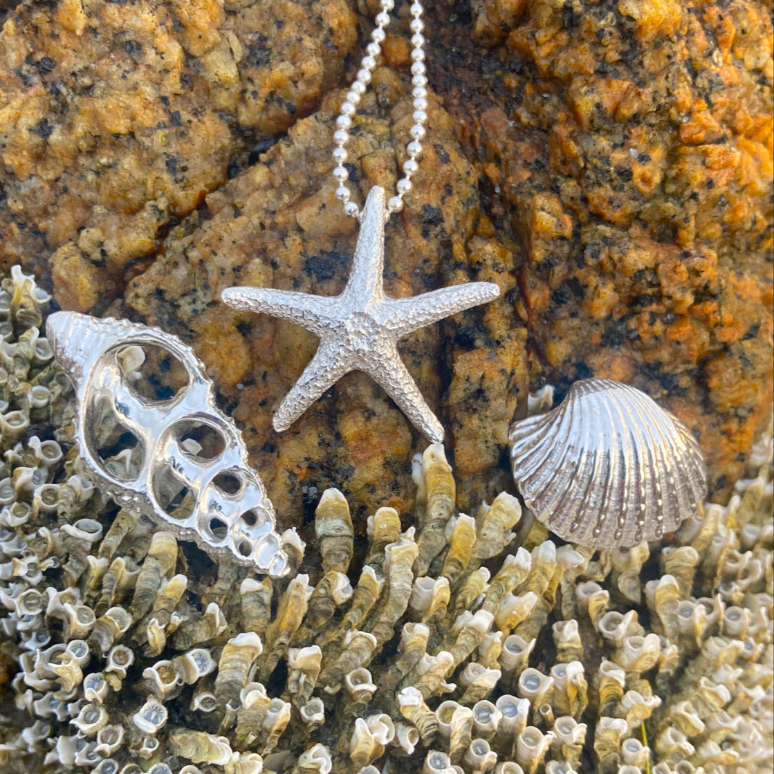Cast silver starfish and shell pendants on a 40 0r 45cm sterling silver chain by Mornington Sea Glass