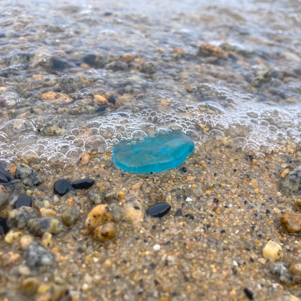 Local turquoise sea glass photographed by Mornington Sea Glass at beach on the Mornington  Peninsula, Victoria, Australia.