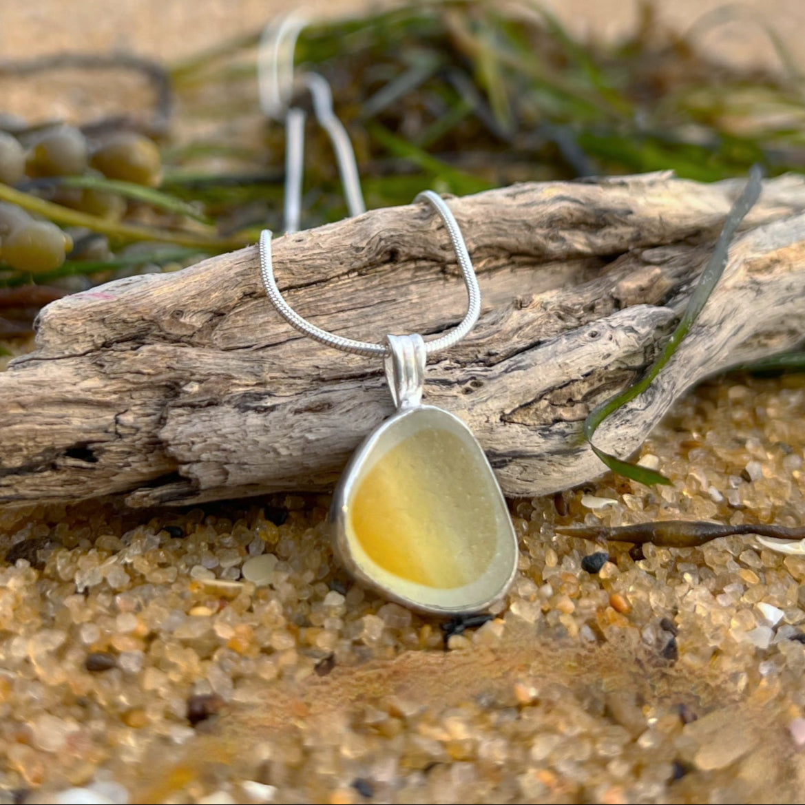 Rare yellow and white multi colour sea glass from England set in silver. Comes with a 40 or 45cm sterling silver chain. Pendant necklace by Mornington Sea Glass