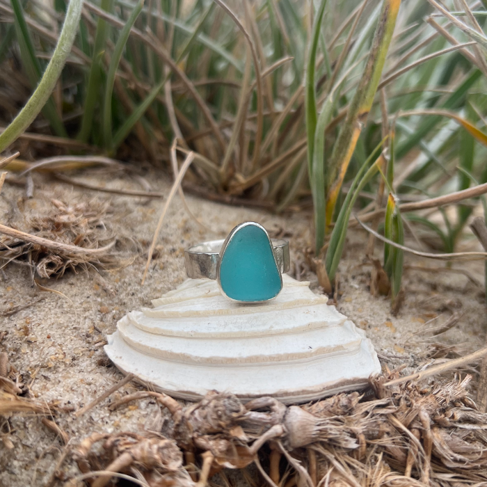 Aqua Teal sea glass set in silver on a hammered silver ring band by Mornington Sea Glass. Size 9