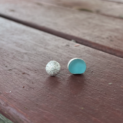 Blue sea glass set in Argentium silver and Sterling silver sea urchin shell cast charm with sterling silver posts and butterfly backs by Mornington Sea Glass