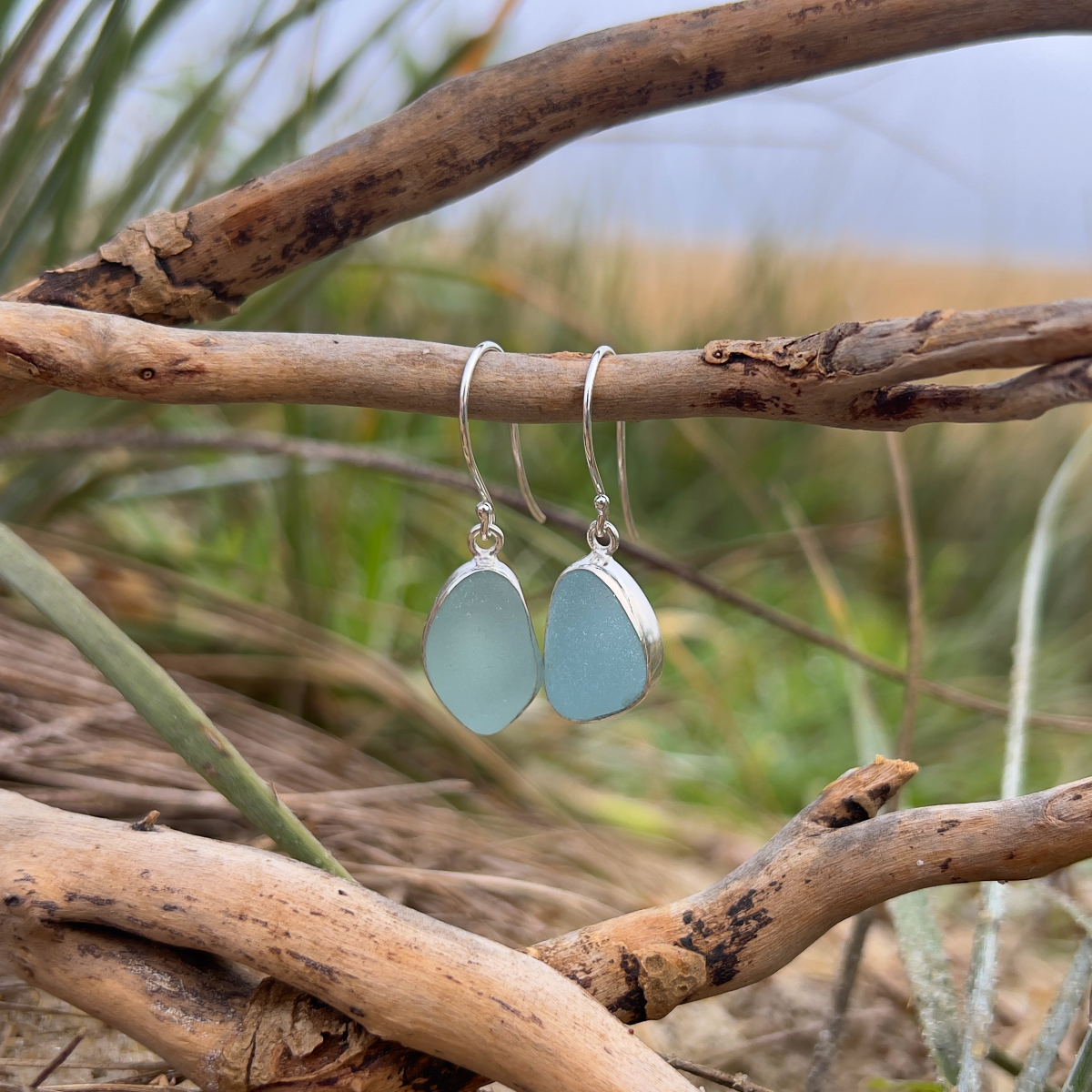 Pale blue sea glass set in silver earrings by Mornington Sea Glass