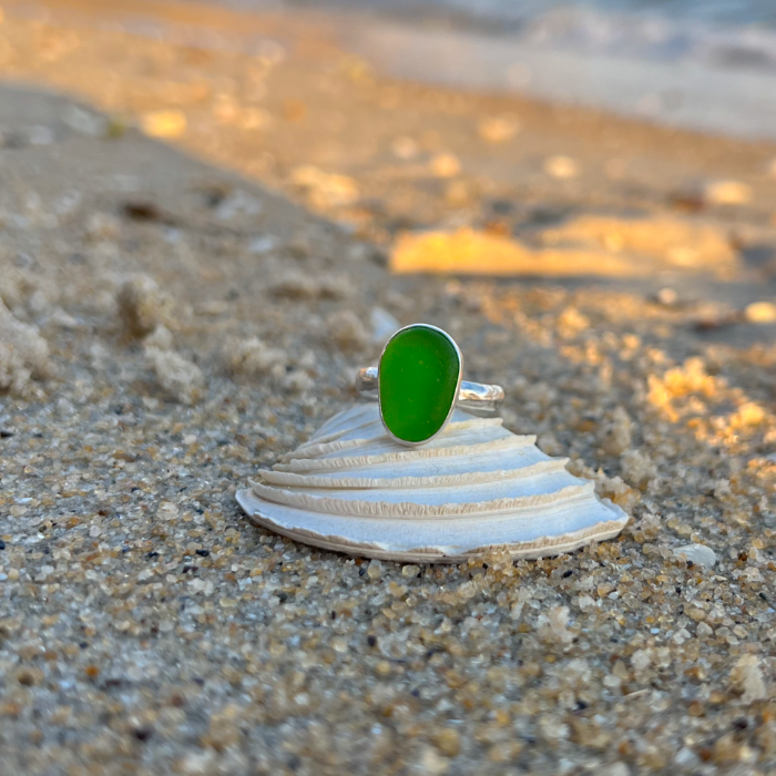 Green sea glass set in silver on organic hammered ring band by Mornington Sea Glass. Size 7.