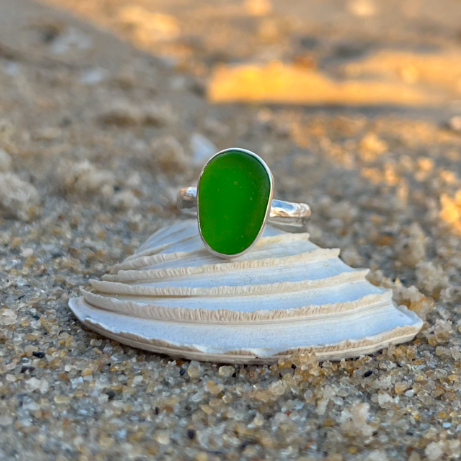 Green sea glass set in silver on organic hammered ring band by Mornington Sea Glass. Size 7.