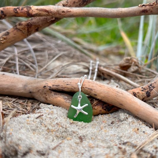 Green sea glass and sterling silver starfish pendant by Mornington Sea Glass. Hangs on a 40cm + 5cm extension ball detail chain.