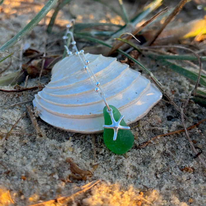 Green sea glass and sterling silver starfish pendant by Mornington Sea Glass. Hangs on a 40cm + 5cm extension ball detail chain.