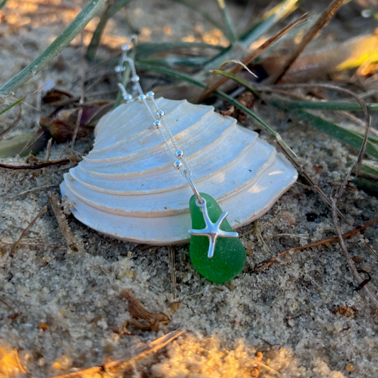 Green sea glass and sterling silver starfish pendant by Mornington Sea Glass. Hangs on a 40cm + 5cm extension ball detail chain.