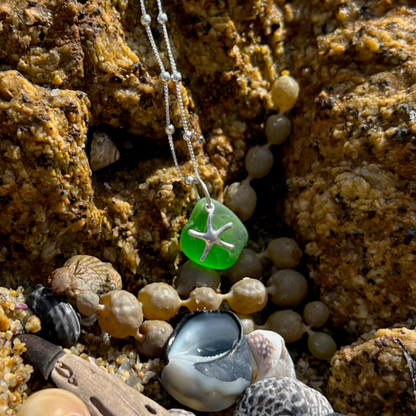 Green sea glass and sterling silver starfish pendant by Mornington Sea Glass. Hangs on a 40cm + 5cm extension ball detail chain.