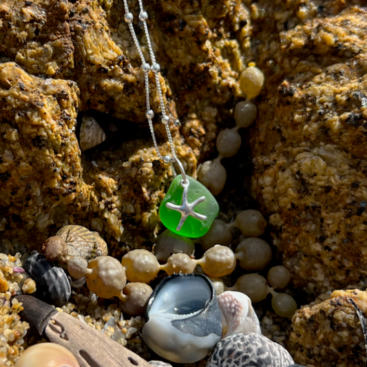 Green sea glass and sterling silver starfish pendant by Mornington Sea Glass. Hangs on a 40cm + 5cm extension ball detail chain.