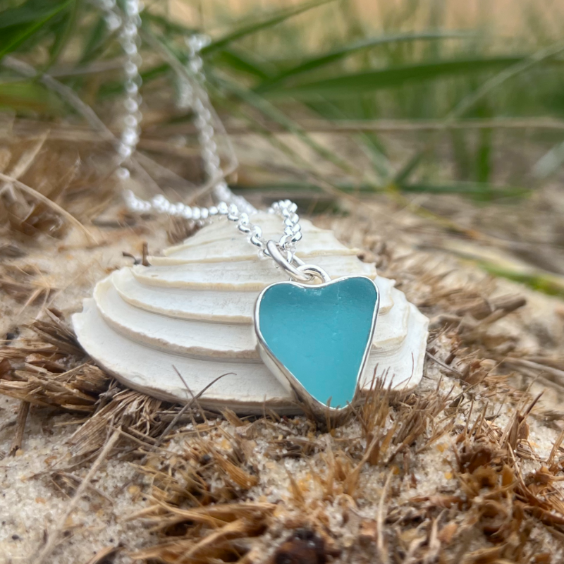 Ocean Teal  naturally shaped sea glass heart set in silver pendant by Mornington Sea Glass. Comes with a 40 or 45cm sterling silver  chain.
