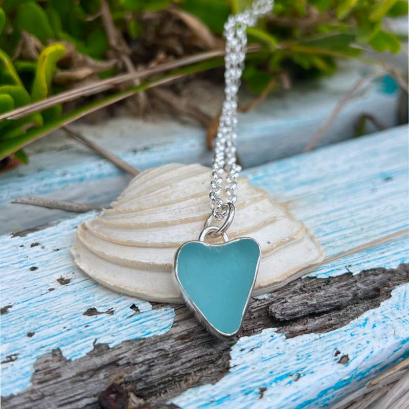 Ocean Teal  naturally shaped sea glass heart set in silver pendant by Mornington Sea Glass. Comes with a 40 or 45cm sterling silver  chain.