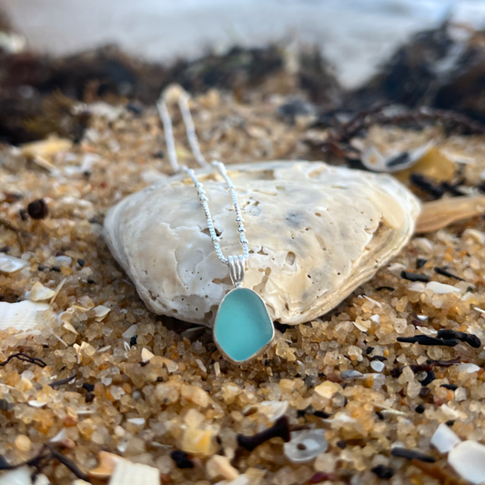 Ocean Teal sea glass set in silver pendant by Mornington Sea Glass. Hangs on a 40 or 45cm sterling silver chain