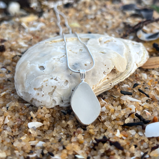 White Sea glass set in silver pendant by Mornington Sea Glass. Hangs on a 40cm  or 45cm sterling silver snake chain