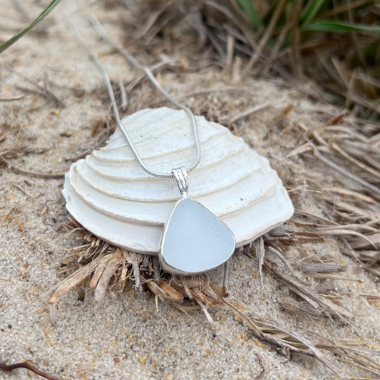 White Sea glass set in silver pendant by Mornington Sea Glass. Hangs on a 40cm  or 45cm sterling silver snake chain