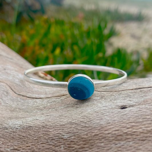 Rare blue multi colour sea glass solid silver bangle. 65mm diameter. By Mornington Sea Glass.