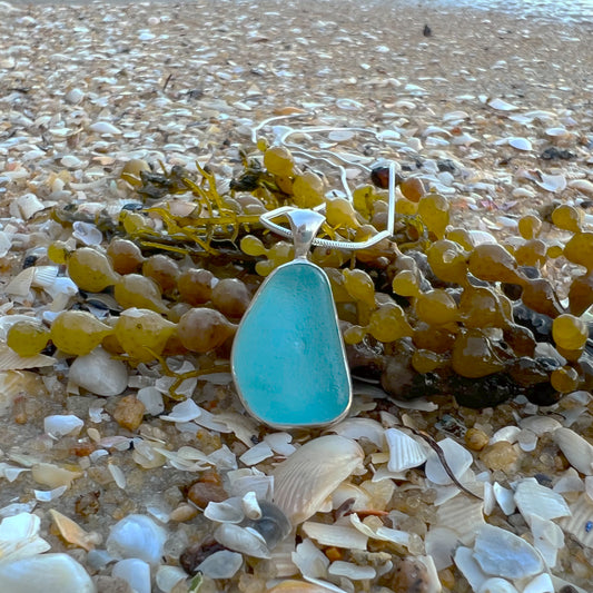 Blue sea glass set in silver pendant by Mornington Sea Glass. Comes with a 40 ro 45cm sterling silver chain.