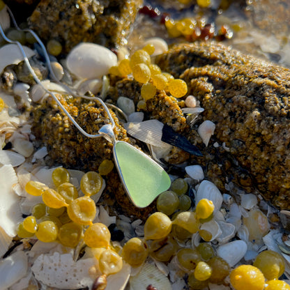 Soft green sea glass and silver pendant by Mornington Sea Glass.