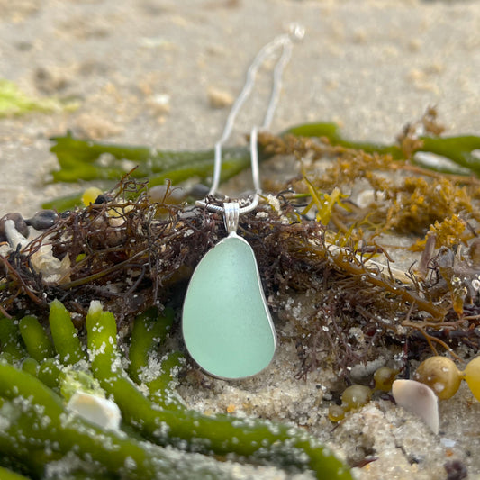 Soft green sea glass set in silver pendant by Mornington Sea Glass. Comes with a 40 or 45cm sterling silver snake chain