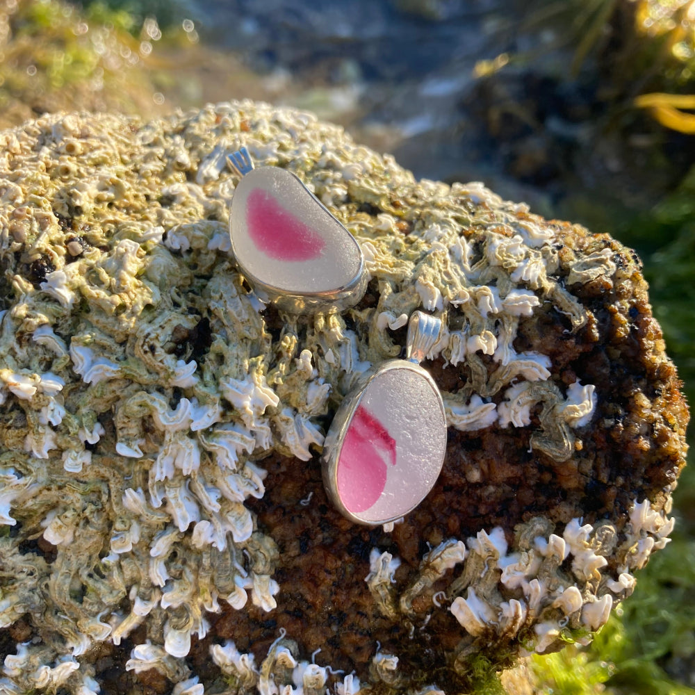 Pink and white English multi colour sea glass pendants by Mornington Sea Glass. Photographed at rock pools on the Mornington  Peninsula, Victoria, Australia.