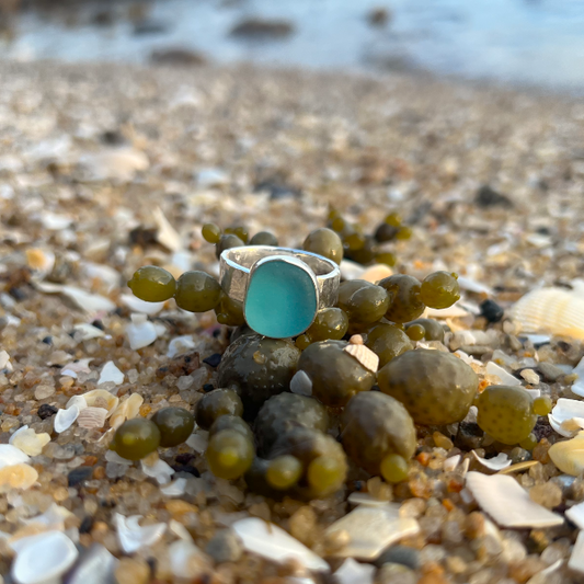Ocean Teal sea glass set in silver on a cast driftwood inspired silver ring band by Mornington Sea Glass. Size 8 1/4