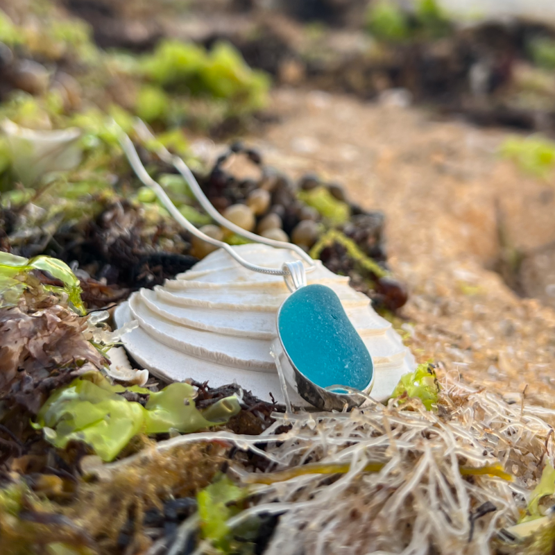 Ocean teal sea glass set in silver pendant by Mornington Sea Glass. Comes with a 40 or 45cm snake chain.