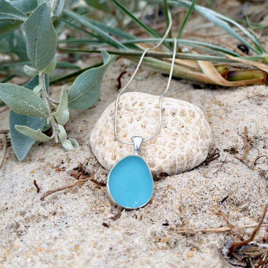 Ocean blue sea glass handset in Argentium silver by Mornington Sea Glass. Hangs on a 40 or 45cm sterling  silver snake chain.