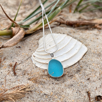 Ocean Teal sea glass handset in Argentium silver by Mornington Sea Glass. Hangs on a 40 or 45cm steering silver snake chain