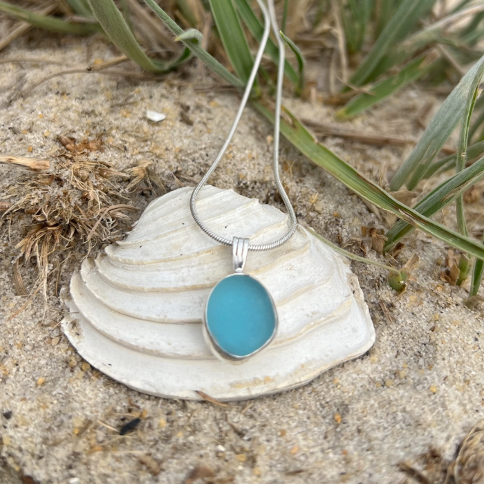 Ocean Teal sea glass set in silver pendant by Mornington Sea Glass. Hangs on a 40 or 45cm sterling silver chain