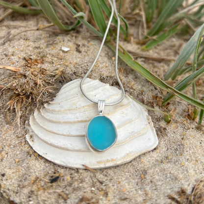 Ocean Teal sea glass set in silver pendant by Mornington Sea Glass. Hangs on a 40 or 45cm sterling silver chain