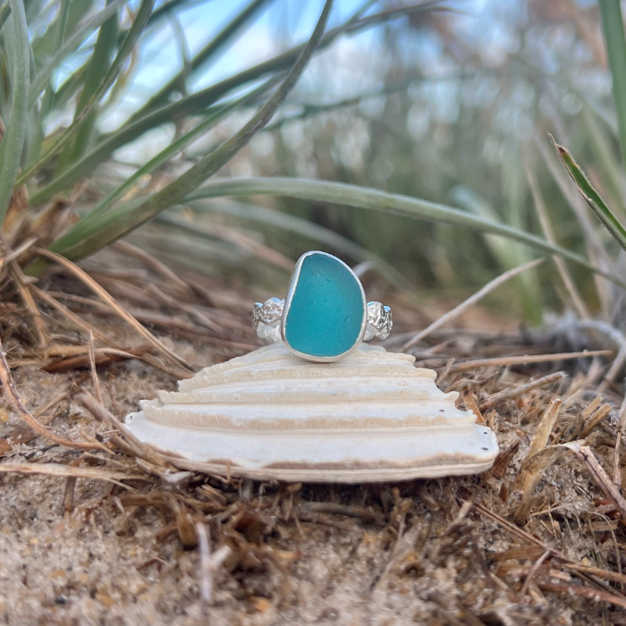 Ocean Teal sea glass set in silver on organic rippled  ring band by Mornington Sea Glass. Size 7.