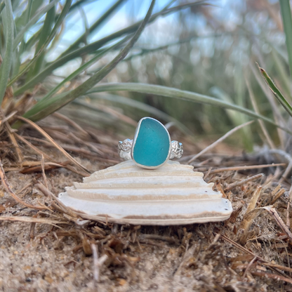 Ocean Teal sea glass set in silver on organic rippled  ring band by Mornington Sea Glass. Size 7.