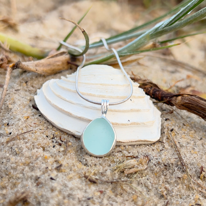 Seafoam sea glass set in silver pendant by  Mornington Sea Glass. Hangs on a 40 or 45cm sterling silver 1mm snake chain