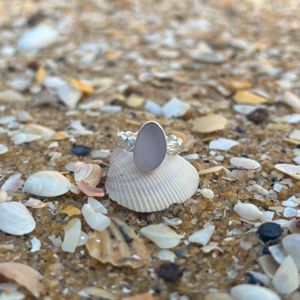 Purple sea glass set in silver on organic hammered ring band by Mornington Sea Glass. Size 7 1/4.