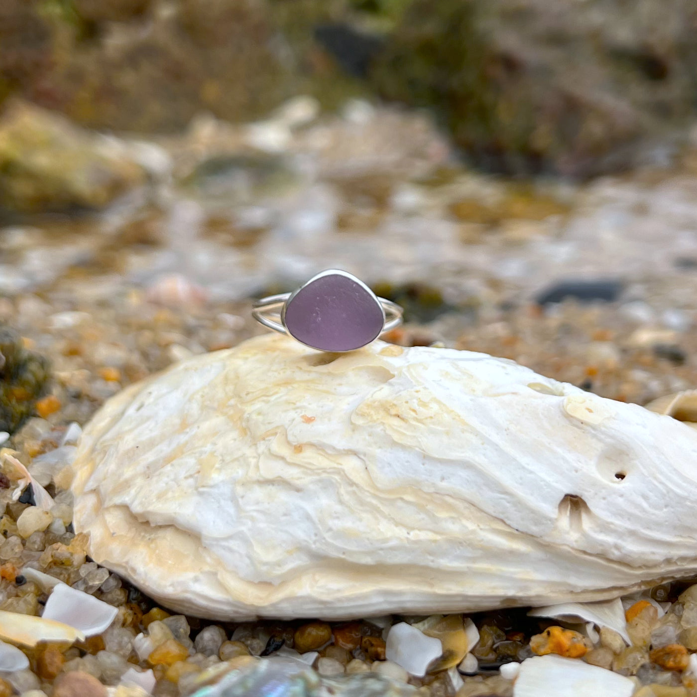 Sterling silver split centre wave ring featuring  green sea glass. Size 6 3/4 By Mornington Sea Glass.