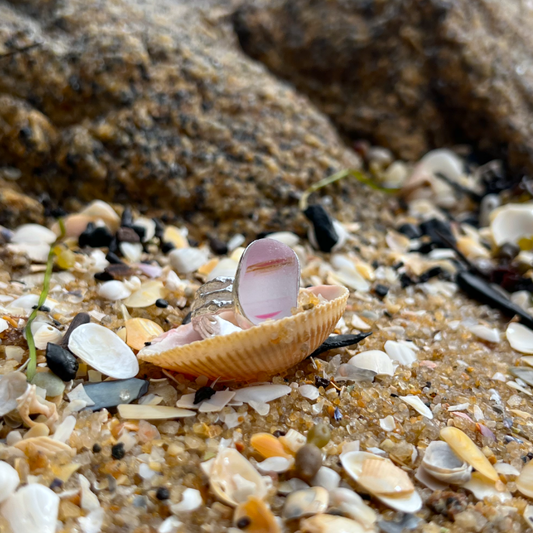 Rare pink and white multi colour sea glass set in silver on a cast driftwood inspired silver ring band by Mornington Sea Glass. Size 8 3/4.