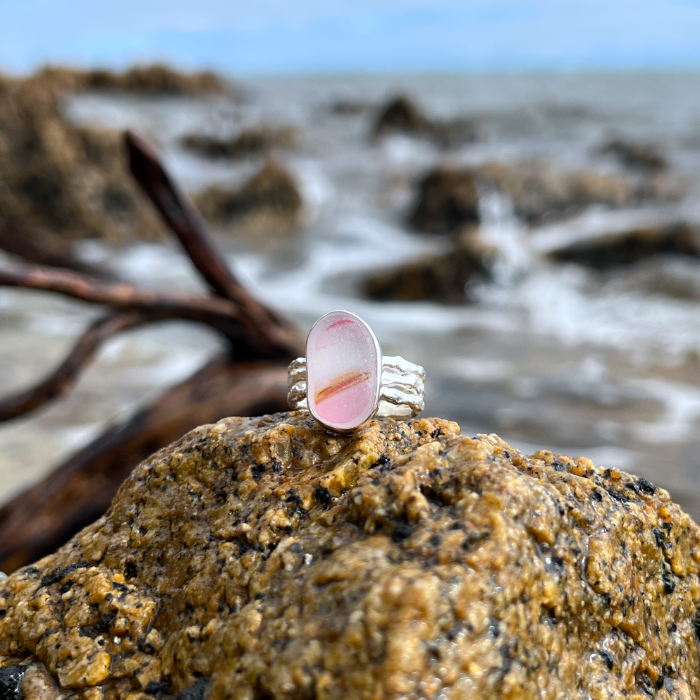 Rare pink and white multi colour sea glass set in silver on a cast driftwood inspired silver ring band by Mornington Sea Glass. Size 8 3/4.