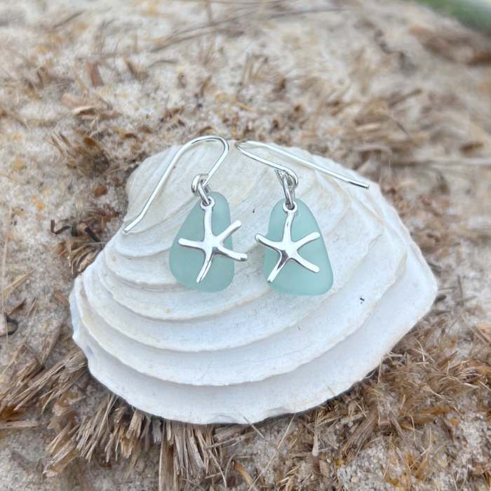 Soft blue sea glass and sterling silver sea star earrings  by Mornington Sea Glass. 