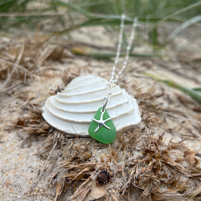 Green sea glass and sterling silver starfish pendant by Mornington Sea Glass. Hangs on a 40cm + 5cm extension ball detail chain.