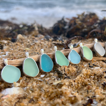 Sea glass set in silver pendants by Mornington Sea Glass