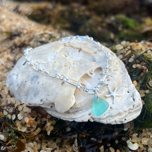 Aqua sea glass and starfish charm sterling silver bracelet by Mornington Sea Glass.