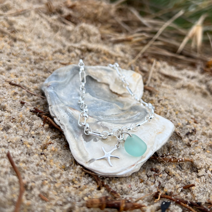 Seafoam blue sea glass and starfish charm sterling silver bracelet by Mornington Sea Glass.