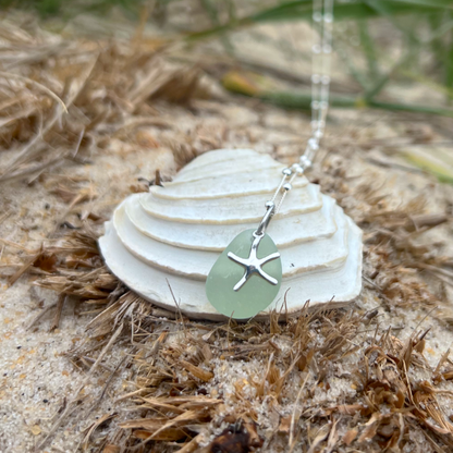 Seafoam sea glass and sterling silver starfish pendant by Mornington Sea Glass. Hangs on a 40cm + 5cm extension ball detail chain.