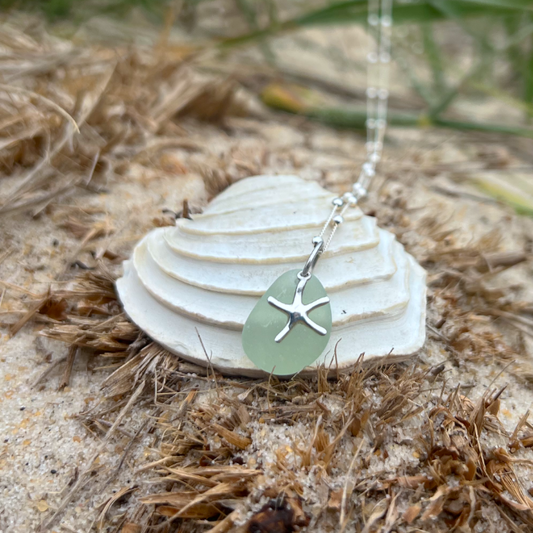 Seafoam sea glass and sterling silver starfish pendant by Mornington Sea Glass. Hangs on a 40cm + 5cm extension ball detail chain.