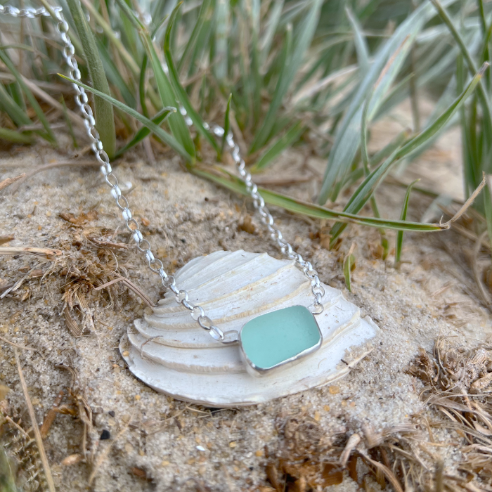 Seafoam sea glass set in silver pendant by Mornington Sea Glass. Hangs on a 40cm  sterling silver belcher chain. 