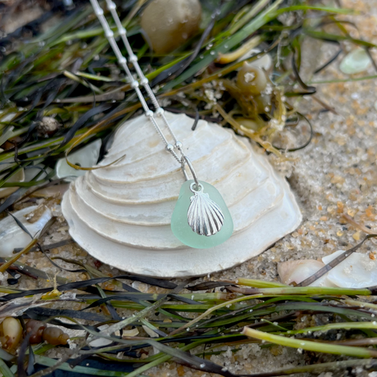 Seafoam sea glass and sterling silver shell  pendant by Mornington Sea Glass. Hangs on a 40cm + 5cm extension ball detail chain.
